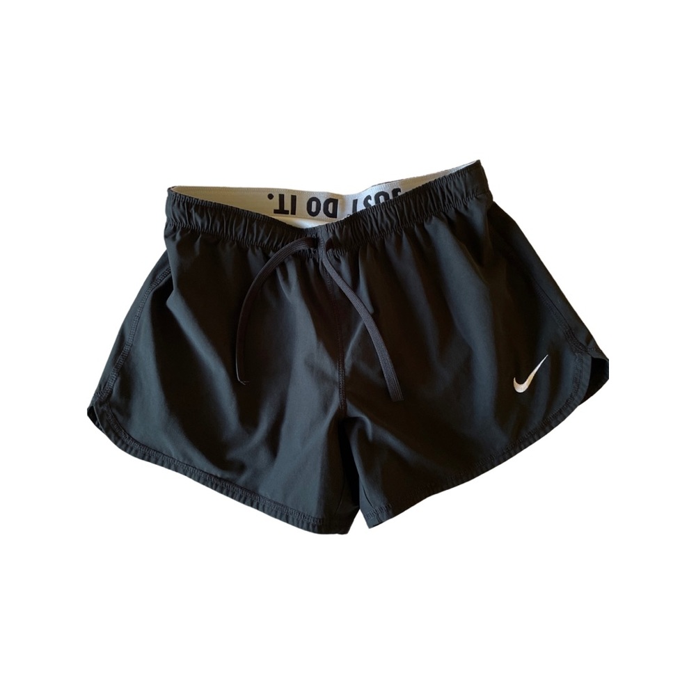 Like new. Nike athletic shorts with built in biker shorts/liner.
